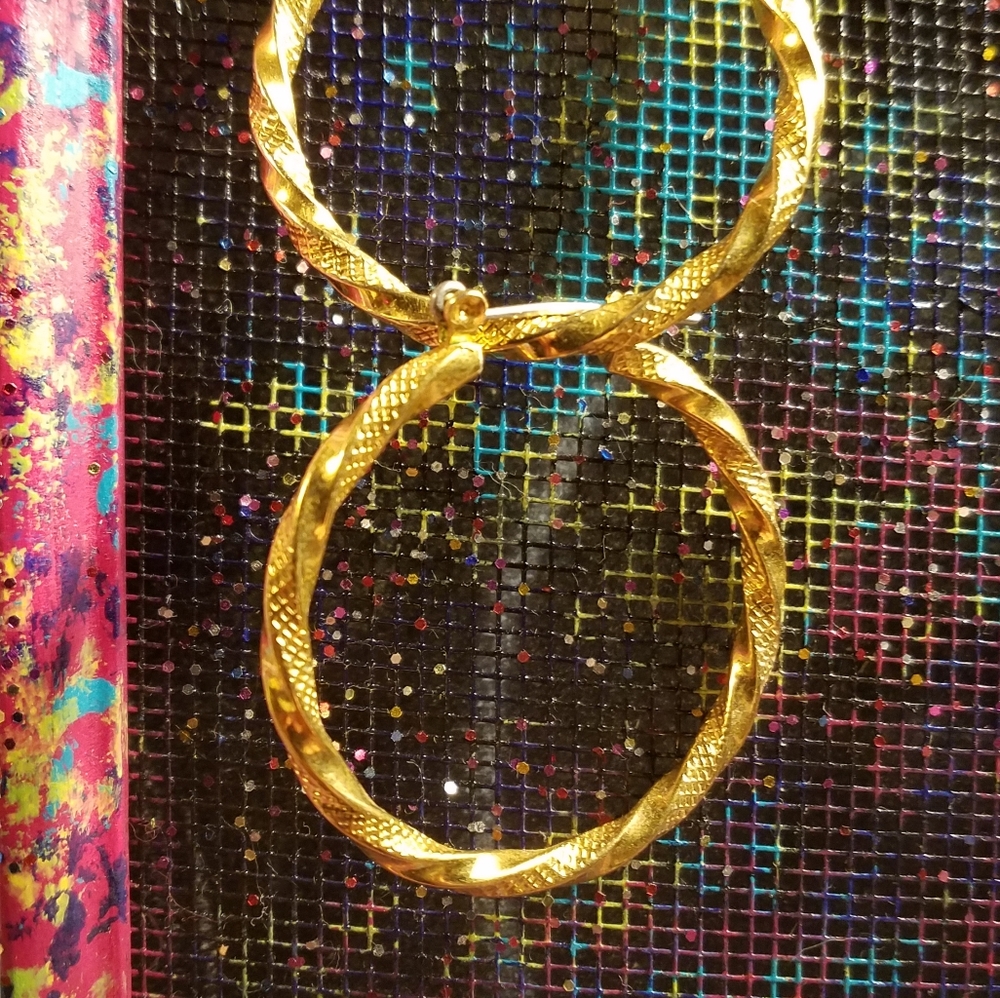 Pair gold tone hoop earrings